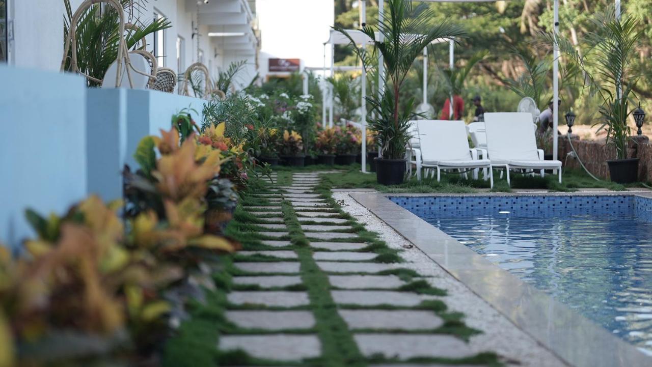 Whiteflower Resort Morjim Buitenkant foto