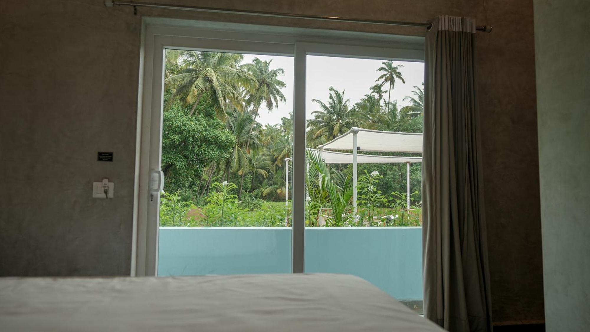 Whiteflower Resort Morjim Buitenkant foto
