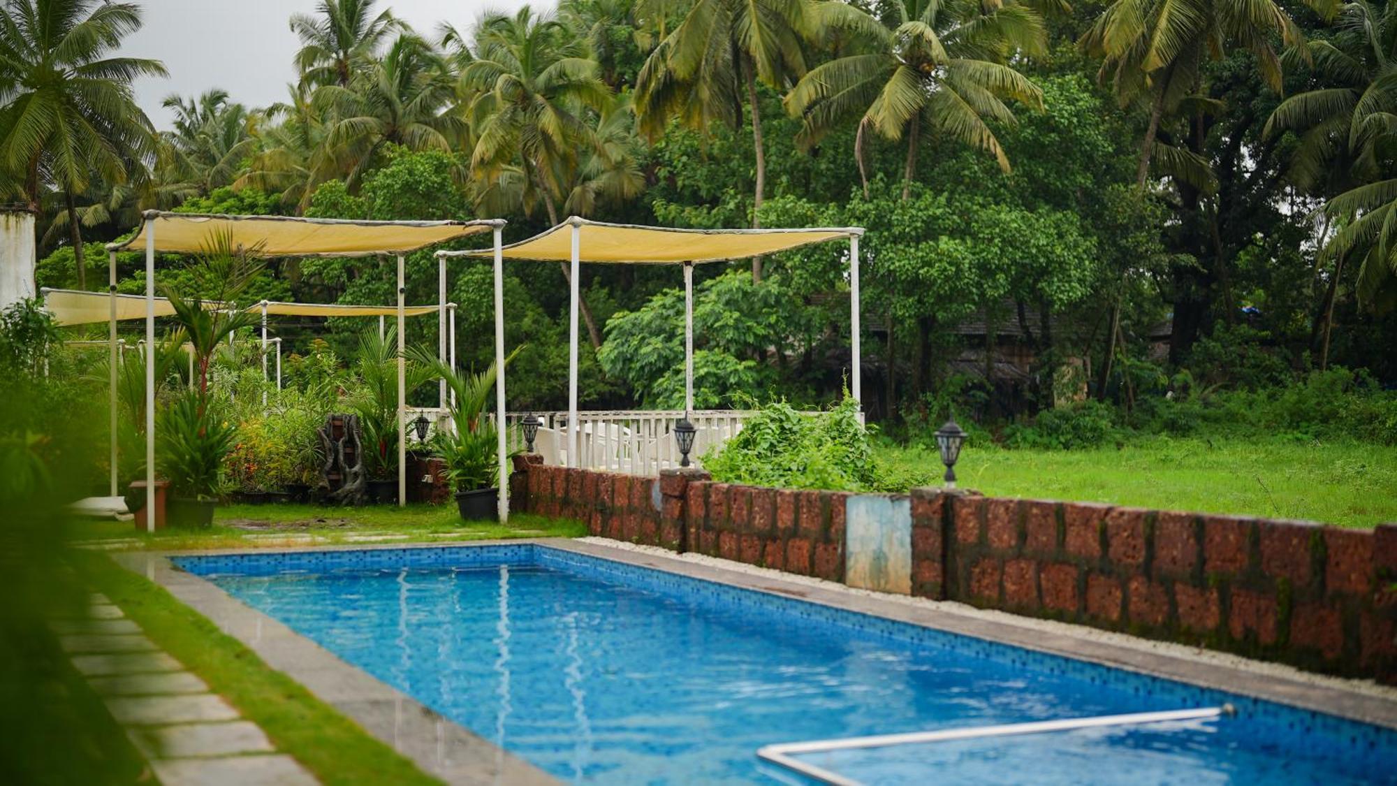 Whiteflower Resort Morjim Buitenkant foto